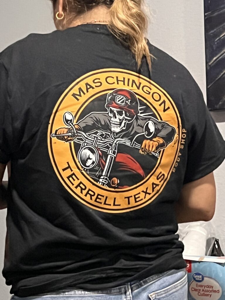 Mas Chingon Bodyshop team member wearing branded shirt in Terrell TX